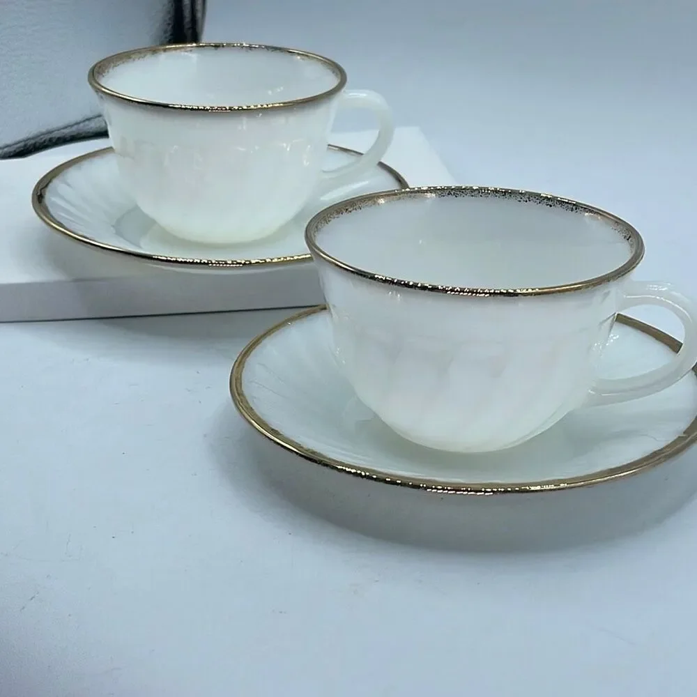 Set of 2 Fire King milk glass swirl pattern cup & saucers.
